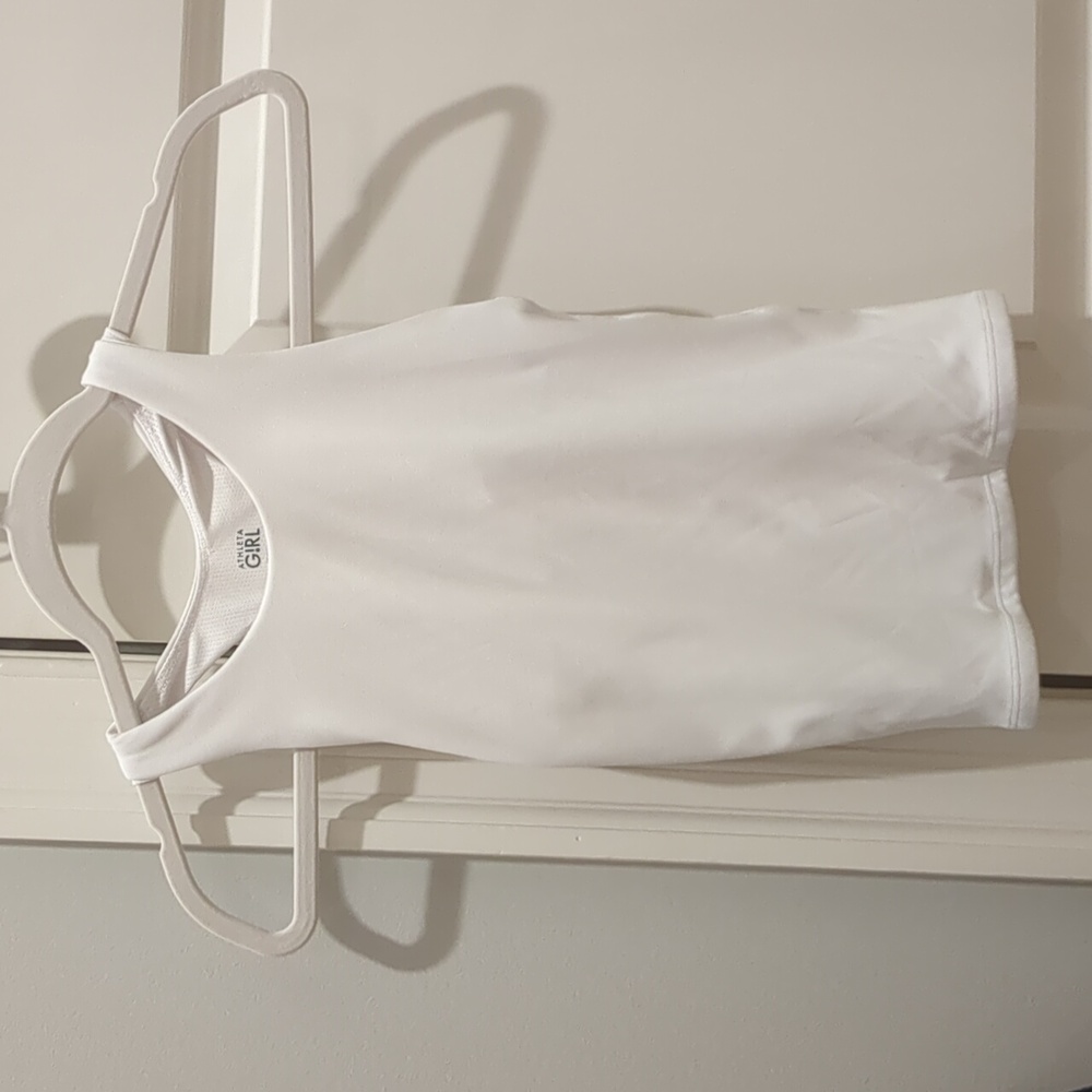 A razer back tank top from athleta. Size girls M (8-10) and it is white.